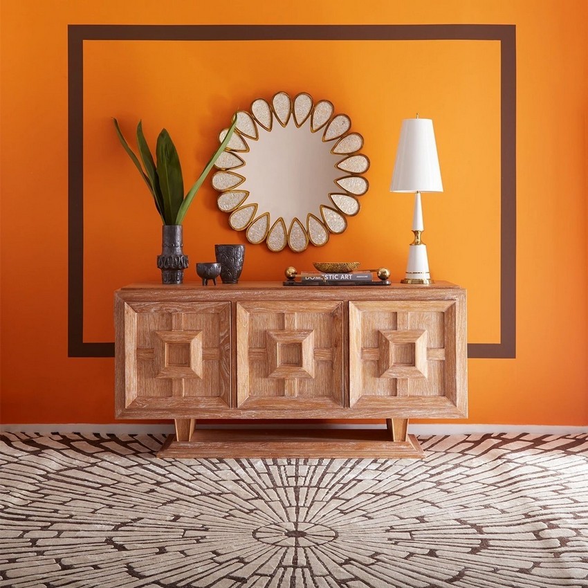 Petal Mirror by Jonathan Adler is a modern chic jewelry piece, expressing a warm natural glow